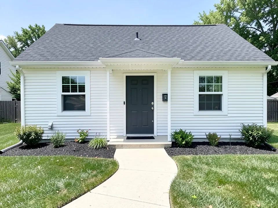 AI-drawn generic stand-in of a one-story ranch house with white siding, white window trim, a dark gray front door and a charcoal roof